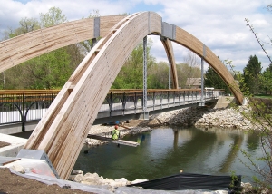 Conceptual and final design for the arches, Glue-Laminated timber design, Erection stability analysis, Detail preparation for arches and quality control review for remaining structure
